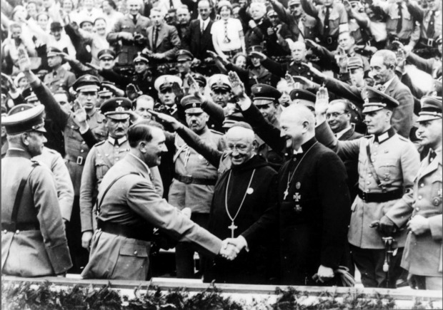 Dictator Adolf Hitler shaking hands with catholic dignitaries, priests, pope, christianity, 3rd reich