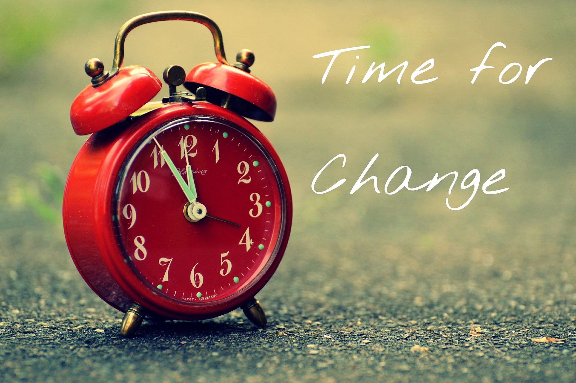 Red alarm clock: Time for change