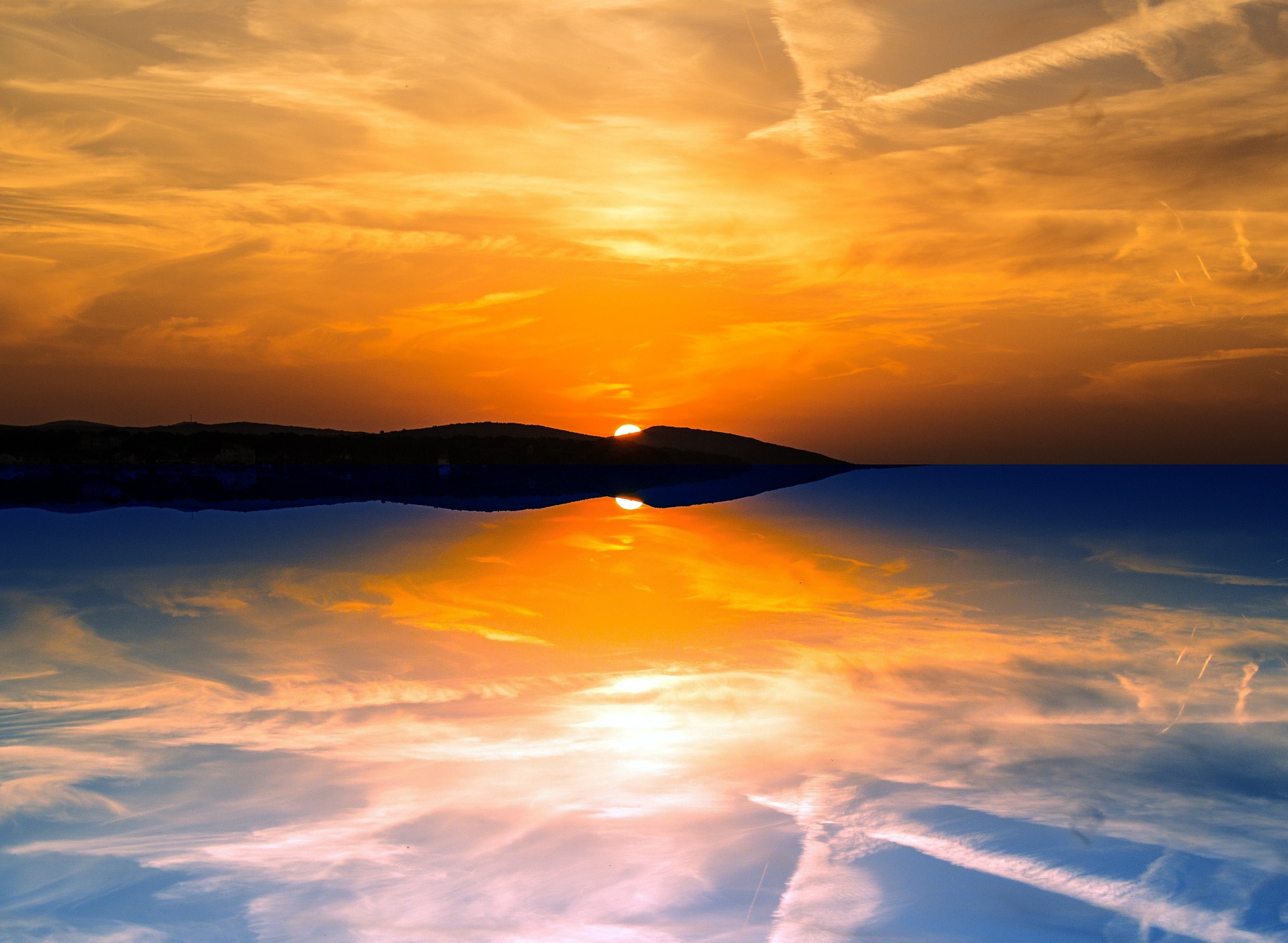 Evening reflections on sunset on lake
