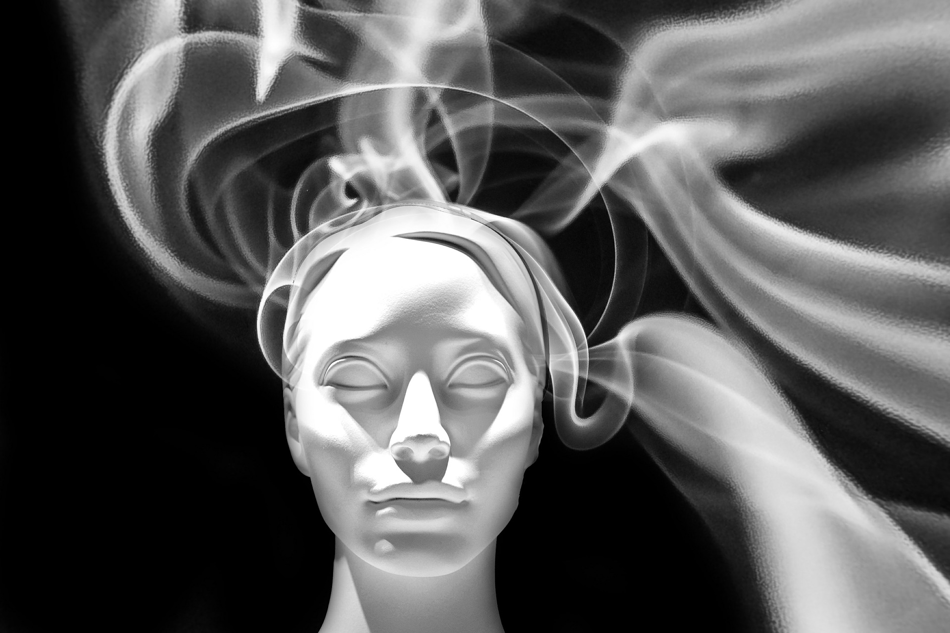 Face in meditation with smoke