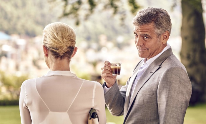 George Clooney with coffee in hand