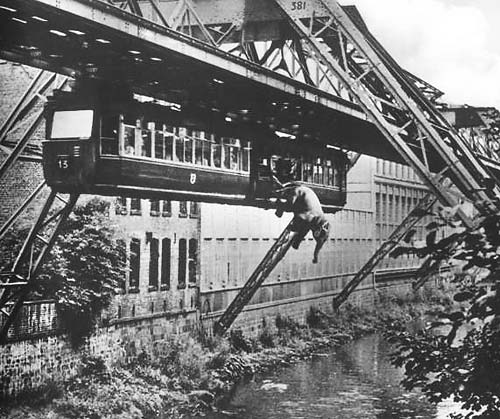 Elephant jumping out of hanging railroad in Wuppertal.