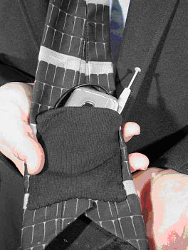 Hightech tie: Solar powered tie (Phone in elastic pocket where phone is charged while tie is worn.) Hightech tie: Solar powered tie (Phone in elastic pocket where phone is charged while tie is worn.)