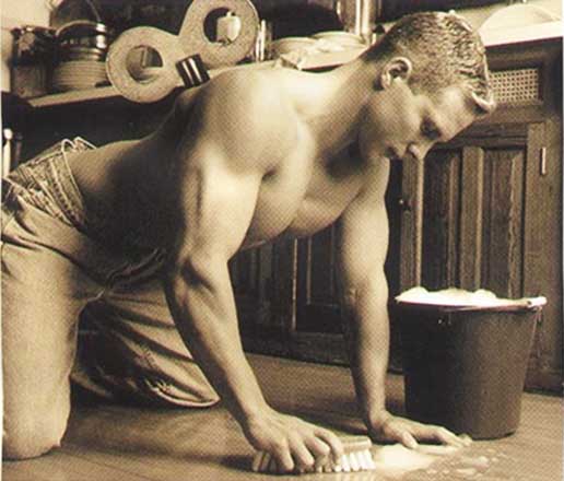 Mann cleaning the floor. Mann putzt den boden.