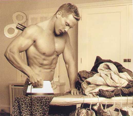 Man ironing clothes. Mann am buegeln.