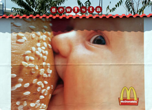 Baby breastfeed on Mc Donald's hamburger...