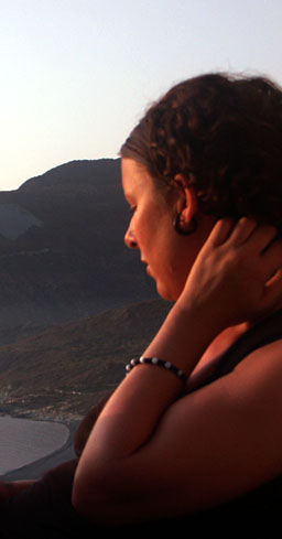Woman looking over beach.
