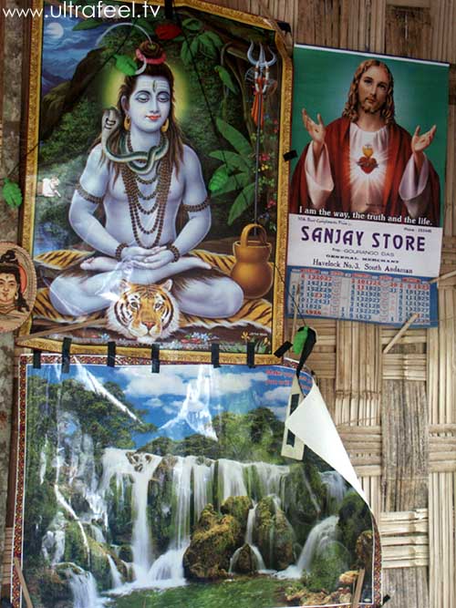 Jesus Christ and Krishna together on a poster in Havelock Island, India. Waterfall picture. (cr) Ultrafeel