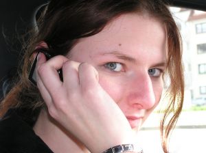 Woman calling on mobile phone.