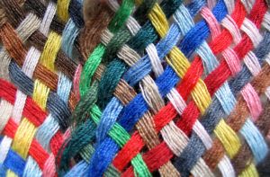 Tapestry made out of colorful threads. Tapestry made out of colorful threads.