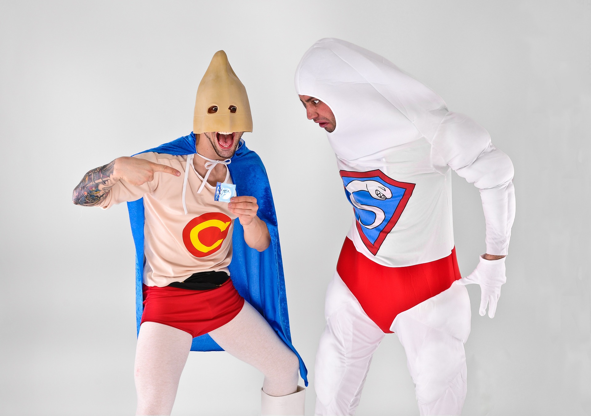 Men in superhero costumes as condoms
