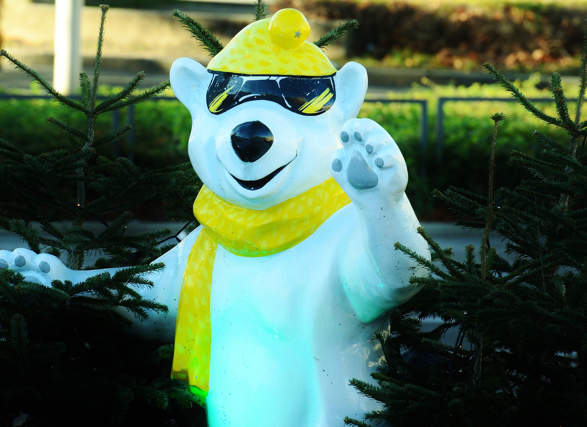 Cool and cute polar bear with yellow scarf and sunglasses