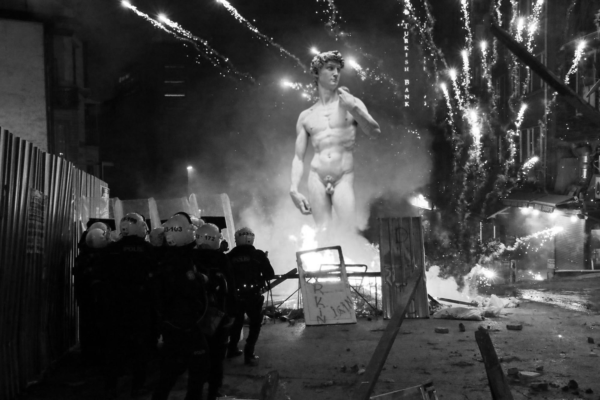 Revolution and rebellion on the streets. Fighting, police, statue of David