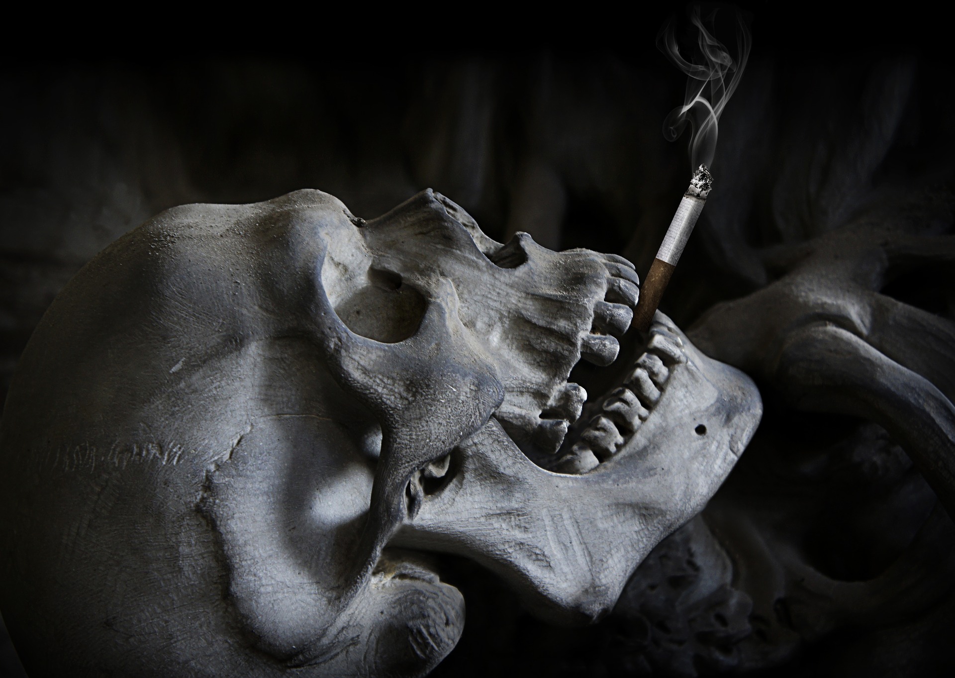 Skull death smoking cigarette