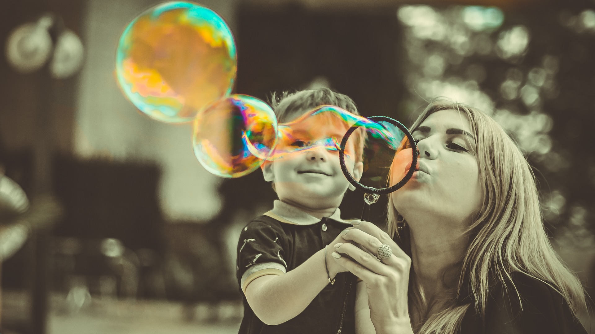 Mother with son and bubbles