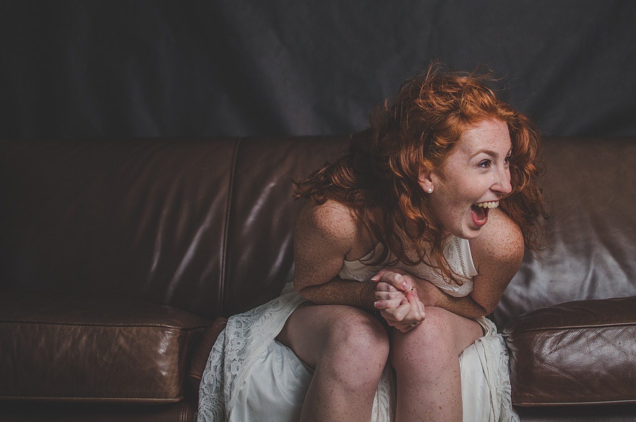 Laughing woman with red hair