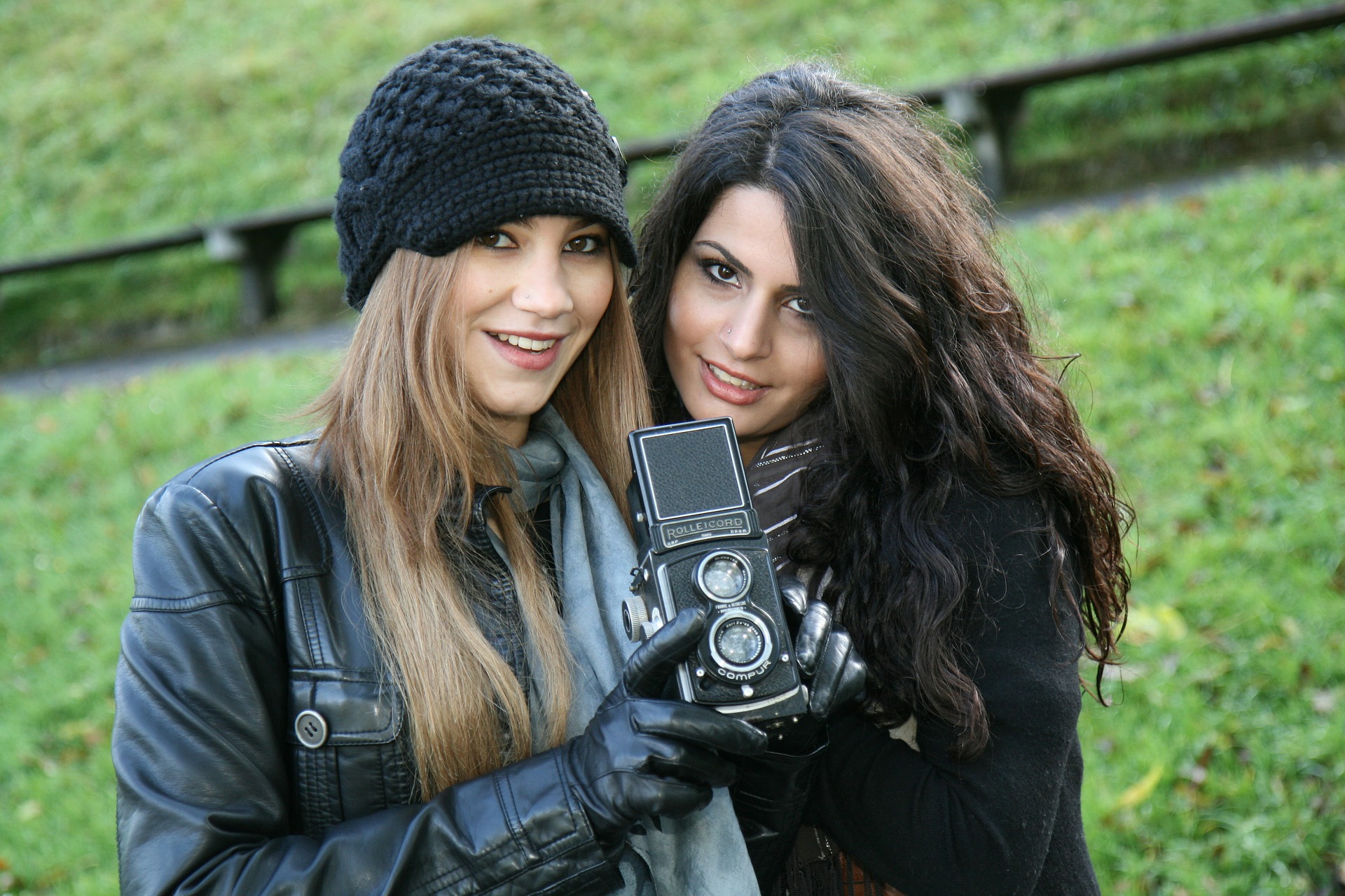 Women with camera photographing